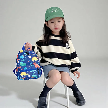SAC DINO BEBE BLEU MANNEQUIN FILLE ASSISE