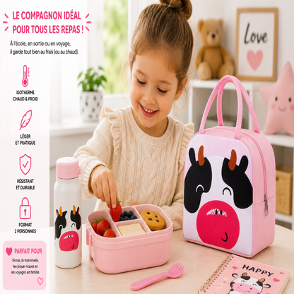 Enfant utilisant le sac isotherme vache rose pendant le repas 