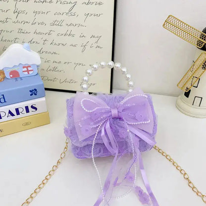 Sac à main pour enfant Édition Violette Perle sur une table