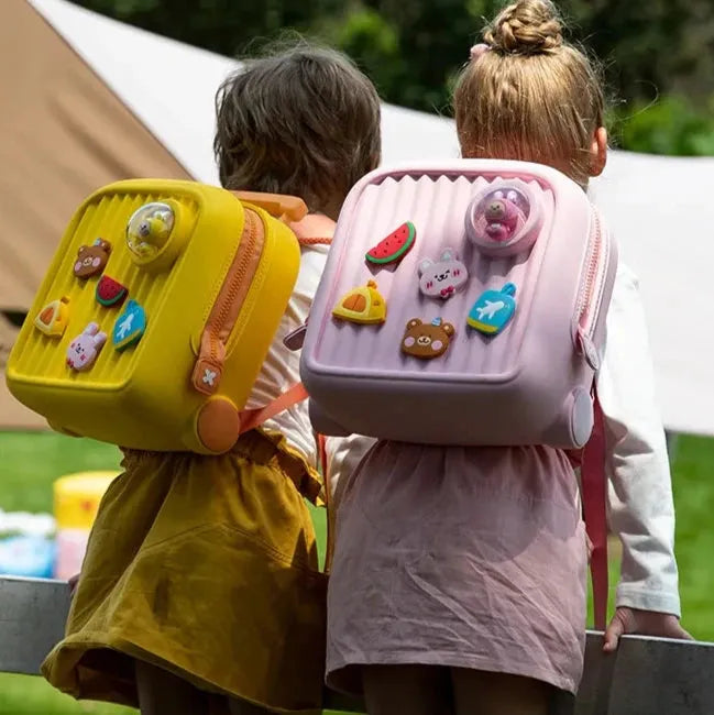 cartable jaune et rose enfant curieux