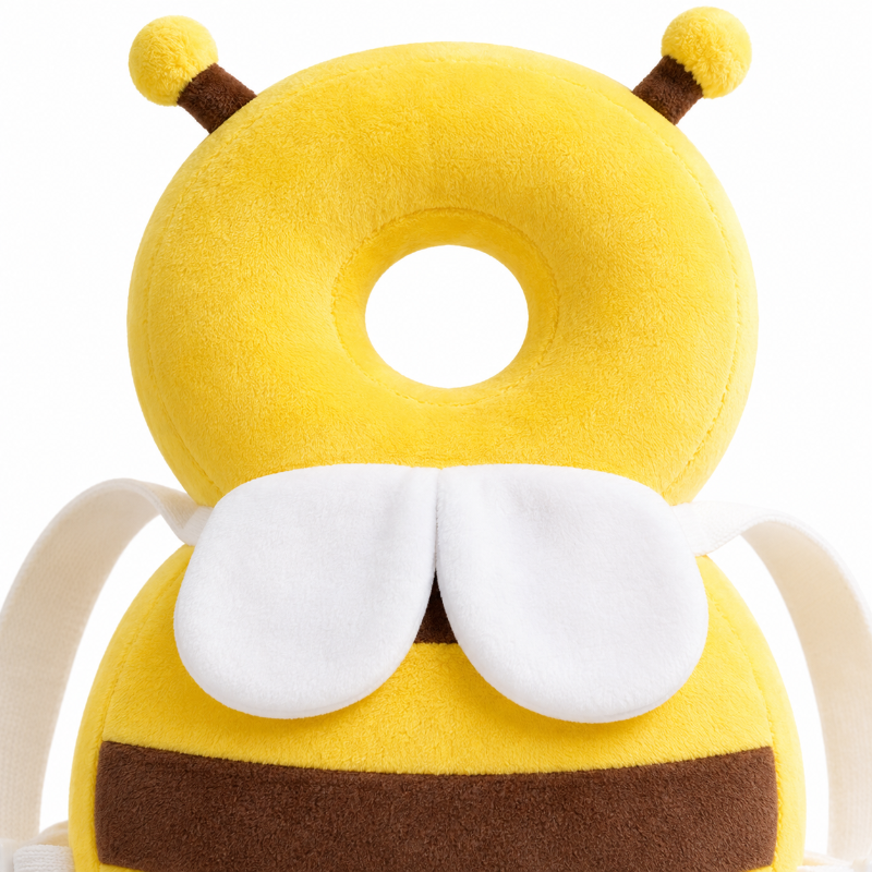 Détail du rembourrage et de l’ouverture centrale du sac à dos bébé anti-chute abeille