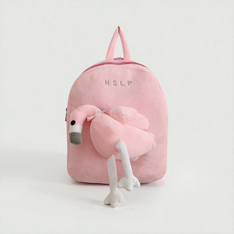 Sac à dos bébé rose en forme de flamant avec peluche intégrée