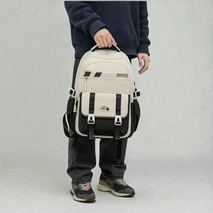 Sac à dos cartable enfant Letter Oxford tenu à la main pour montrer la taille.