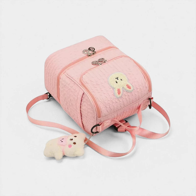 Sac à dos enfant isotherme Lapin Rose posé en angle avec double