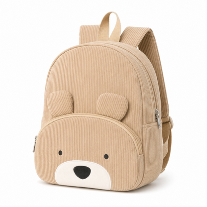 Sac à dos enfant ours beige en velours côtelé avec museau brodé et poche zippée, vue de trois quarts