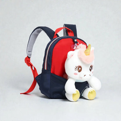 Sac à dos licorne bébé avec peluche placée dans la poche avant ouverte