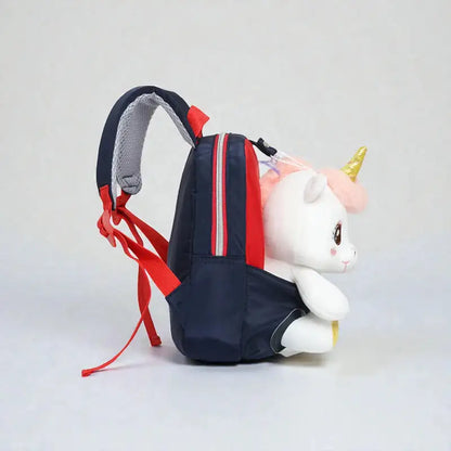 Sac à dos licorne bébé vu de profil avec peluche intégrée
