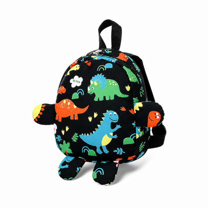 Petit sac à dos maternelle enfant noir à motifs dinosaures colorés avec éléments rembourrés, vue trois-quarts
