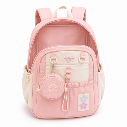 Compartiment principal ouvert et vide du sac à dos primaire fille rose et crème
