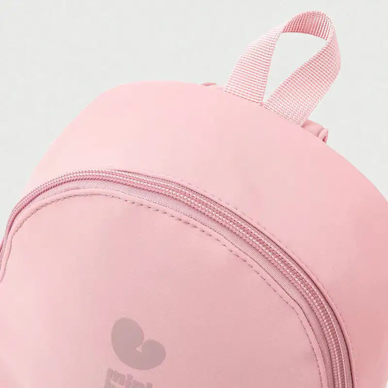 Fermeture zippée et poignée du sac à dos randonnée enfant Mini Bala
