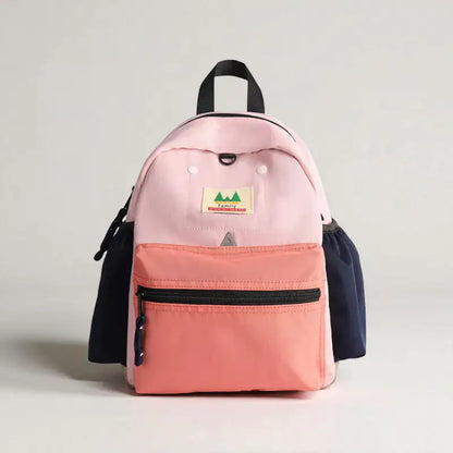 Sac à dos voyage enfant rose poudré vu de face, modèle Édition Rose Atlas