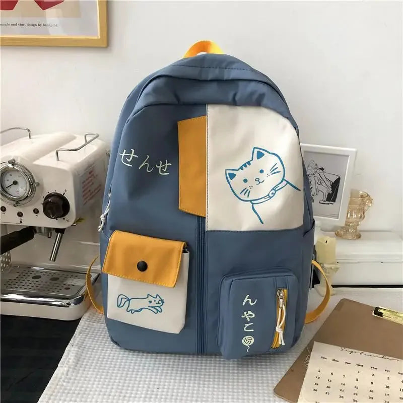 sac a dos bleu chat face